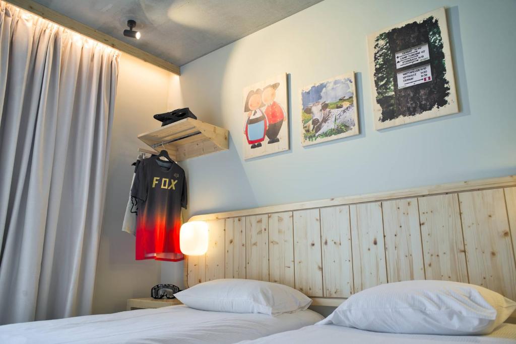 Postel nebo postele na pokoji v ubytování greet hotel Cernay Mulhouse