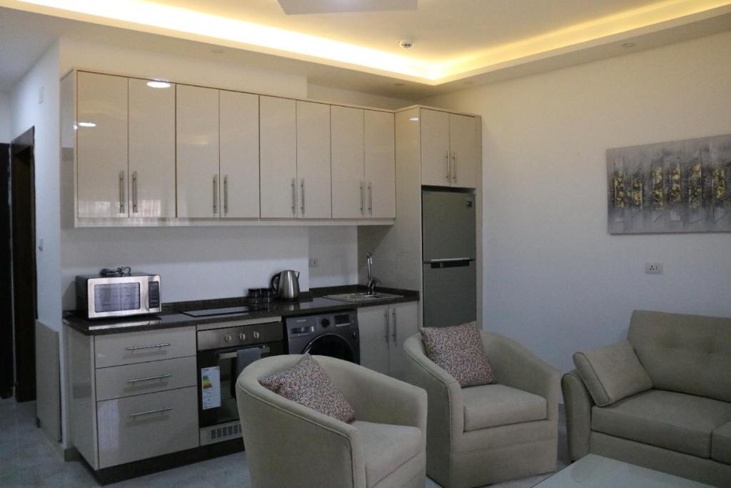 Kuchyň nebo kuchyňský kout v ubytování Executive Apartments