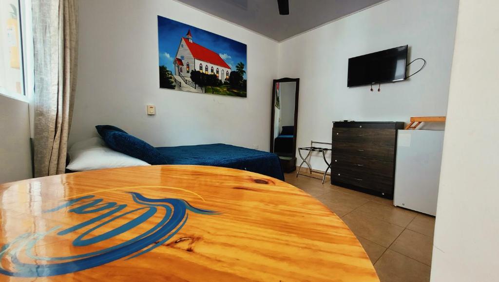 TV a/nebo společenská místnost v ubytování Hotel Olas
