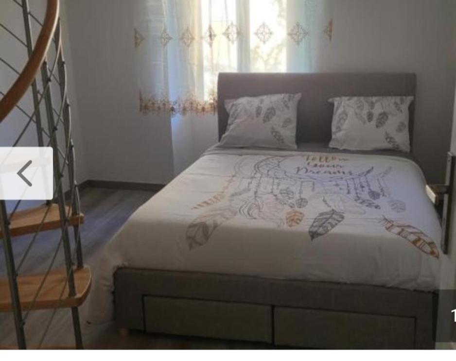 Posteľ alebo postele v izbe v ubytovaní FOUVU family 1