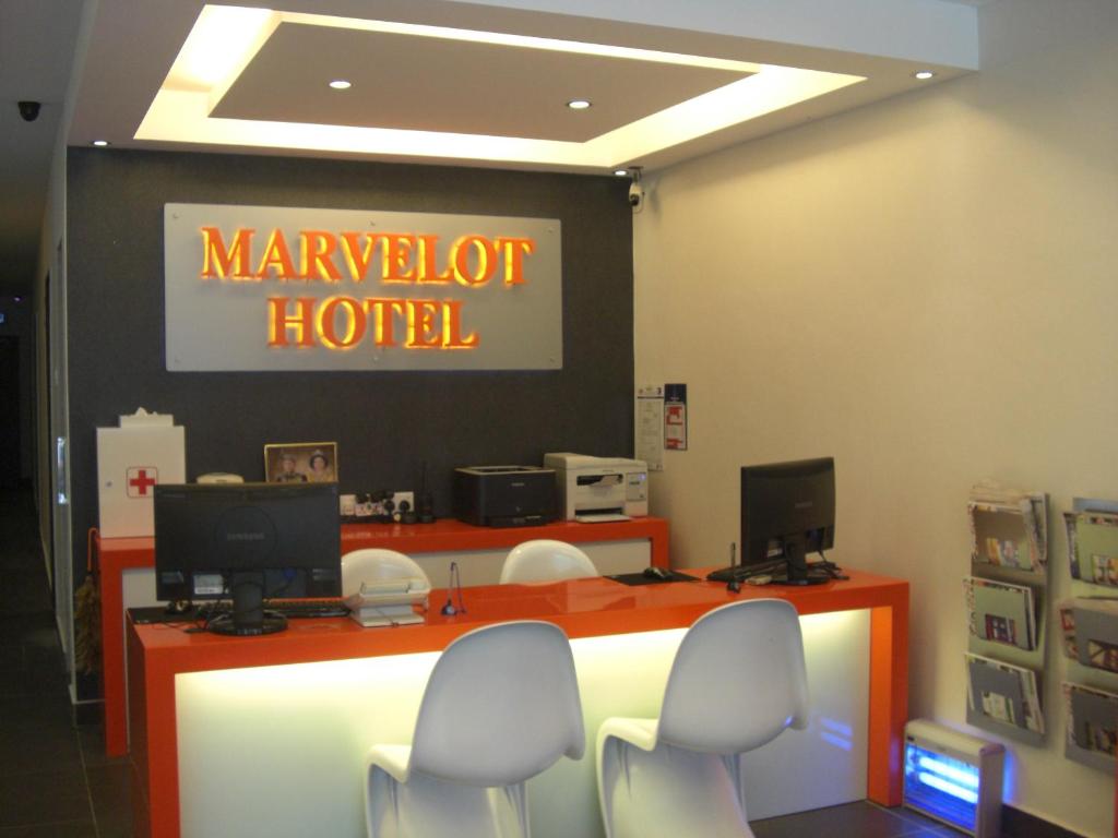 TV a/nebo společenská místnost v ubytování Marvelot Hotel