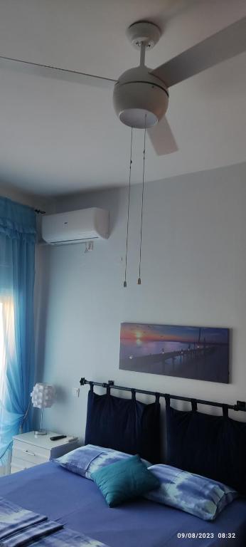 Postel nebo postele na pokoji v ubytování Delphitea Philoxenia