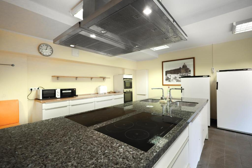 Kuchyň nebo kuchyňský kout v ubytování Pegasus Hostel Berlin