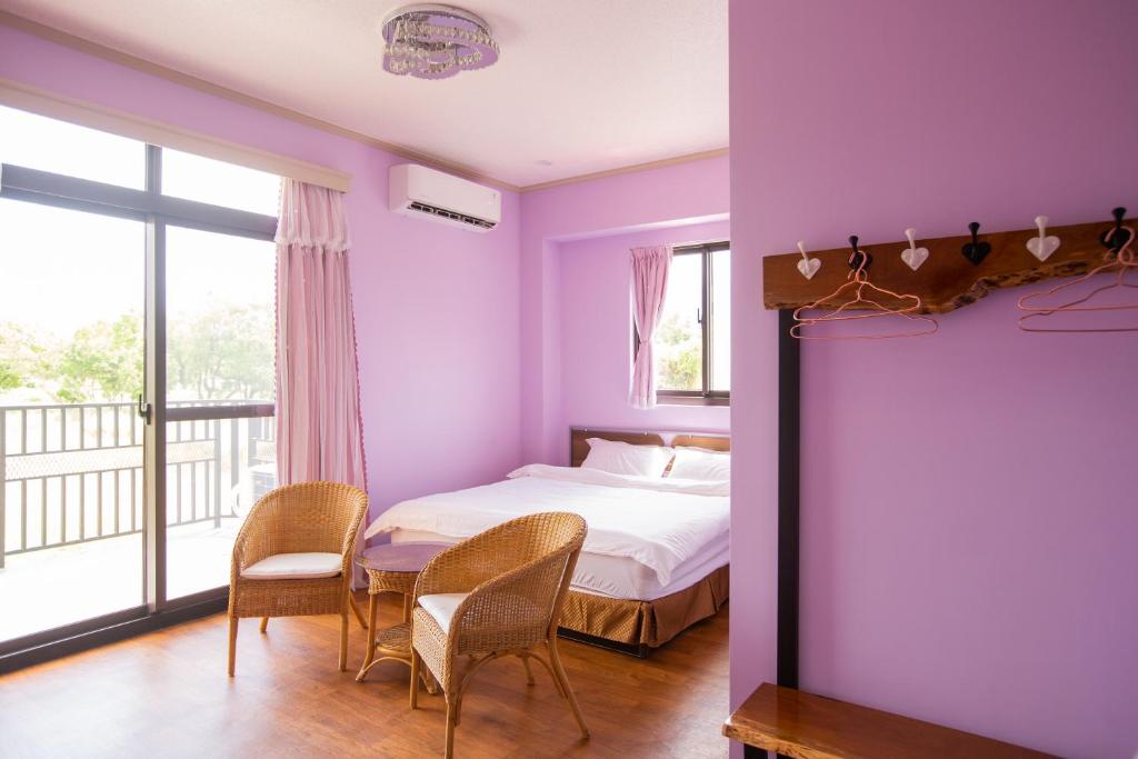Postel nebo postele na pokoji v ubytování Woolywo B&B 花蓮縣民宿第2451號