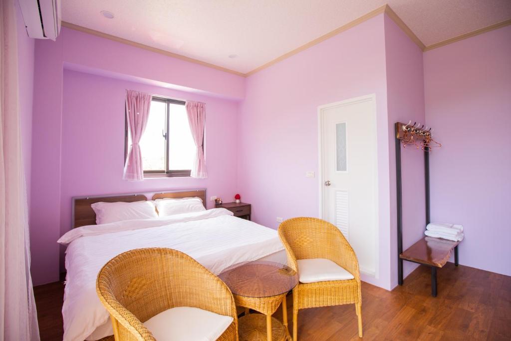 Postel nebo postele na pokoji v ubytování Woolywo B&B 花蓮縣民宿第2451號