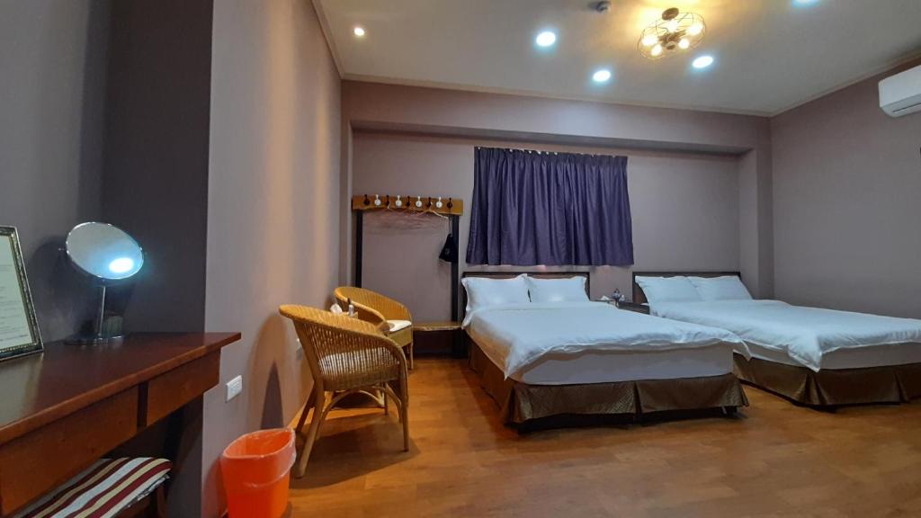 Postel nebo postele na pokoji v ubytování Woolywo B&B 花蓮縣民宿第2451號