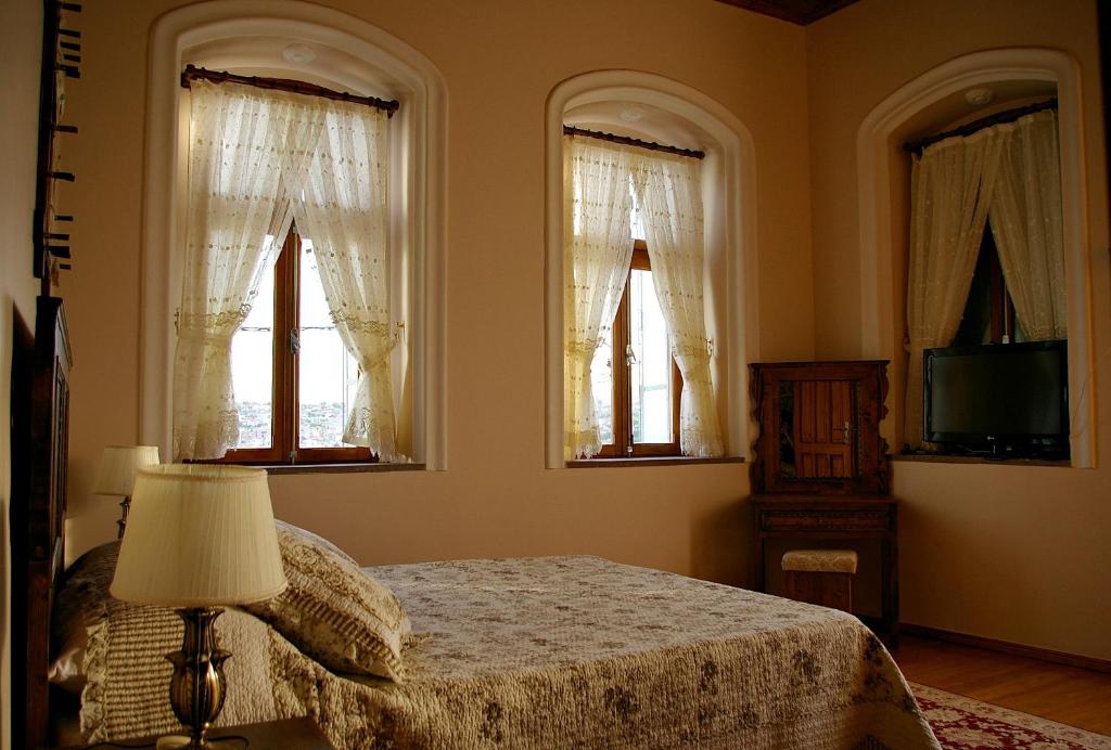 Postel nebo postele na pokoji v ubytování Hera Hotel