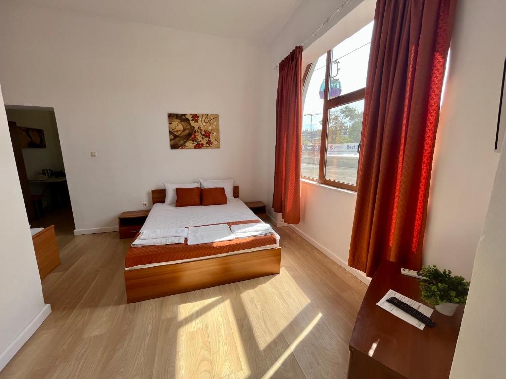 Postel nebo postele na pokoji v ubytování Hostel Cazino Nord Rooms