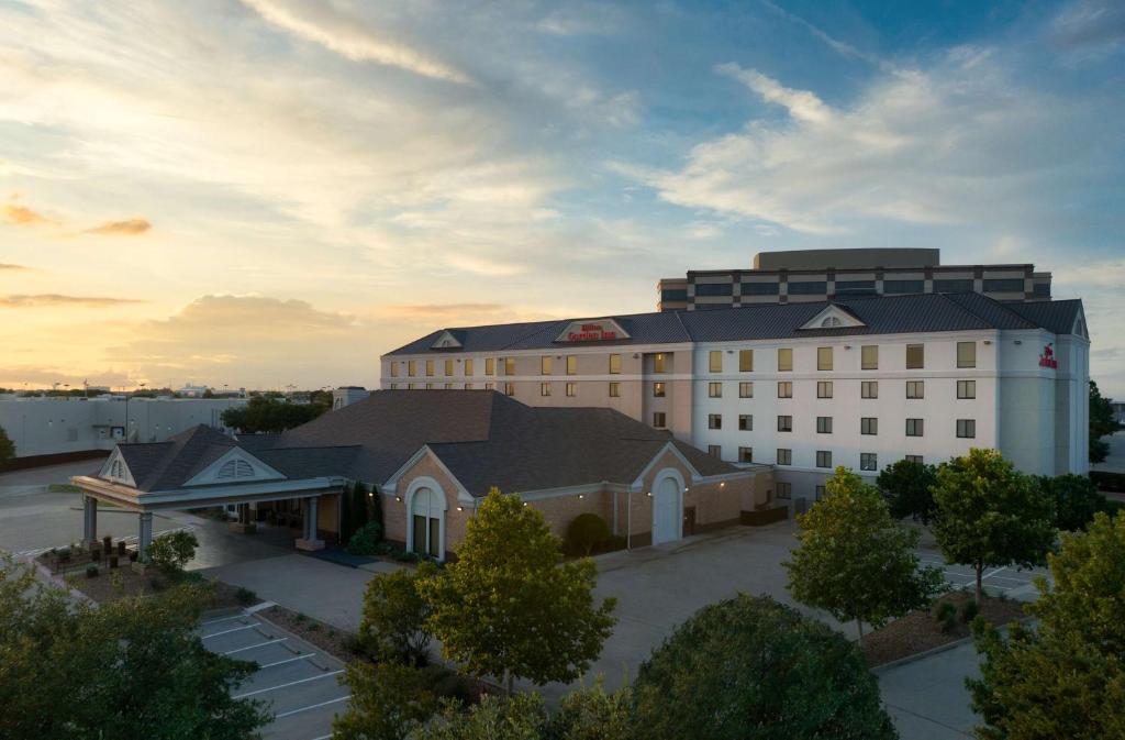 an aerial view of a large white building at Hilton Garden Inn Las Colinas in Irving