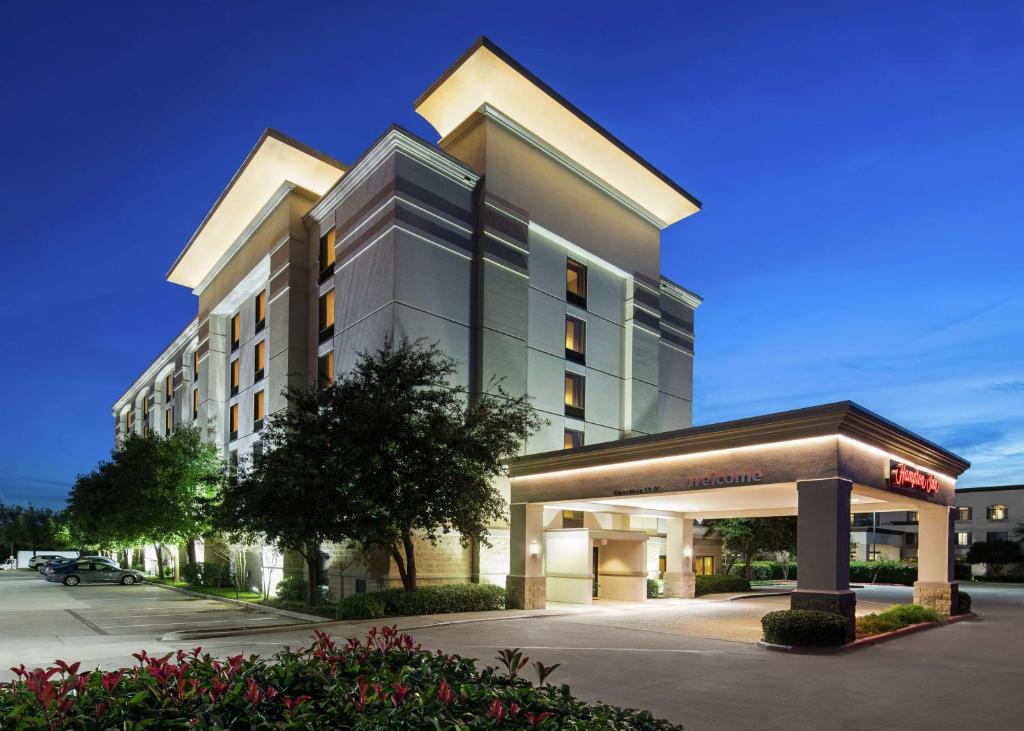 a rendering of a building with a hotel at Hampton Inn Dallas Irving Las Colinas in Irving