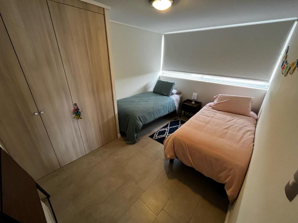 Postel nebo postele na pokoji v ubytování Algarrobo Espectacular piso 10 vista bahía
