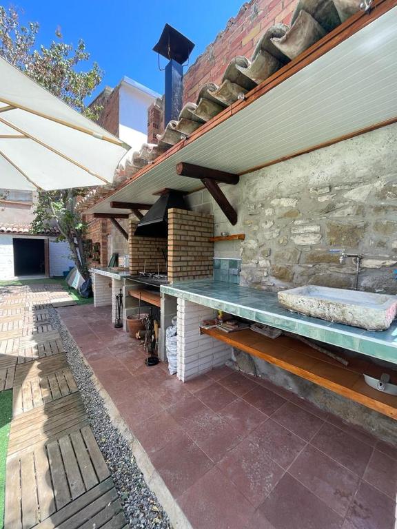 Kép Agradable casa rural con piscina privada szállásáról Vallfogona de Balaguer városában a galériában