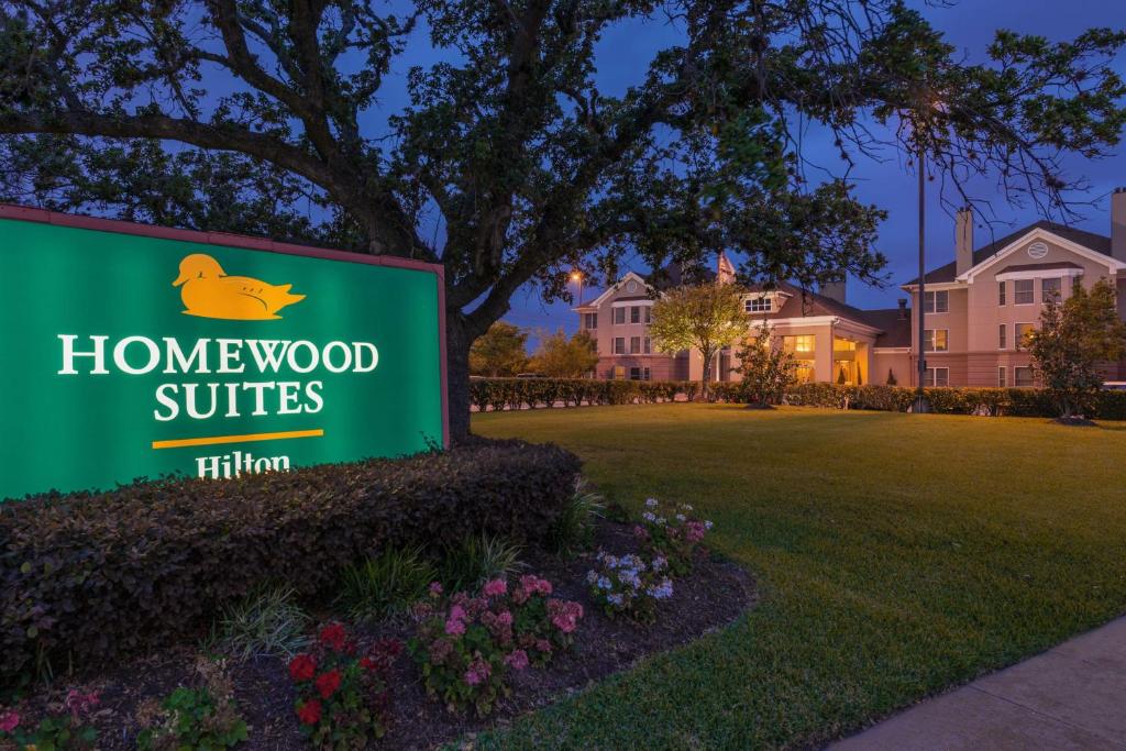 a sign for homewood suites in a yard at Homewood Suites by Hilton Houston-Clear Lake in Webster