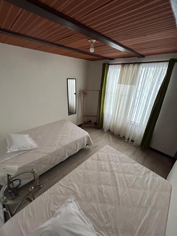 Postel nebo postele na pokoji v ubytování Nat!va 301