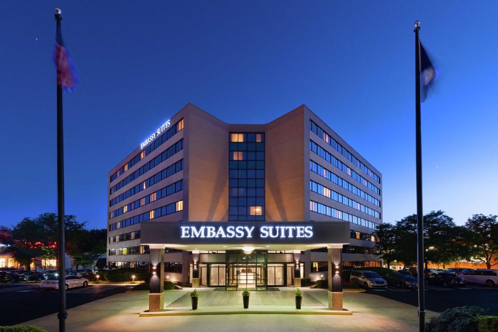 a building with an embassy suites sign in front of it at Embassy Suites Tysons Corner in Tysons Corner