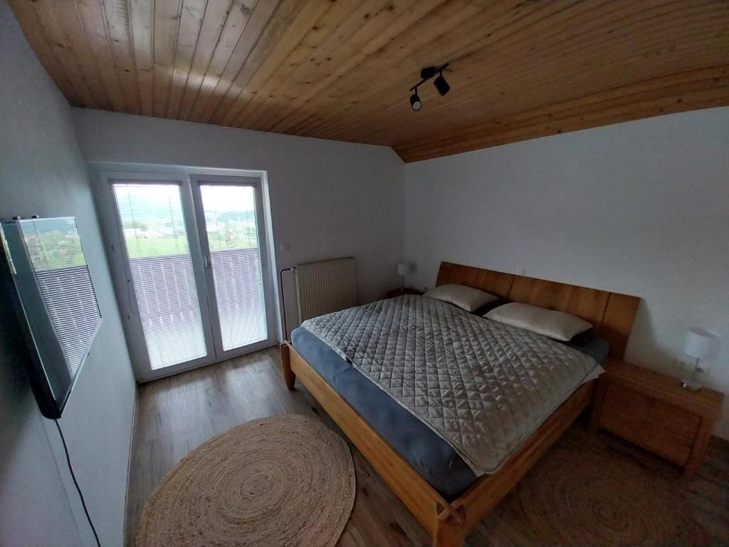 Postel nebo postele na pokoji v ubytování Apartments at Klemen