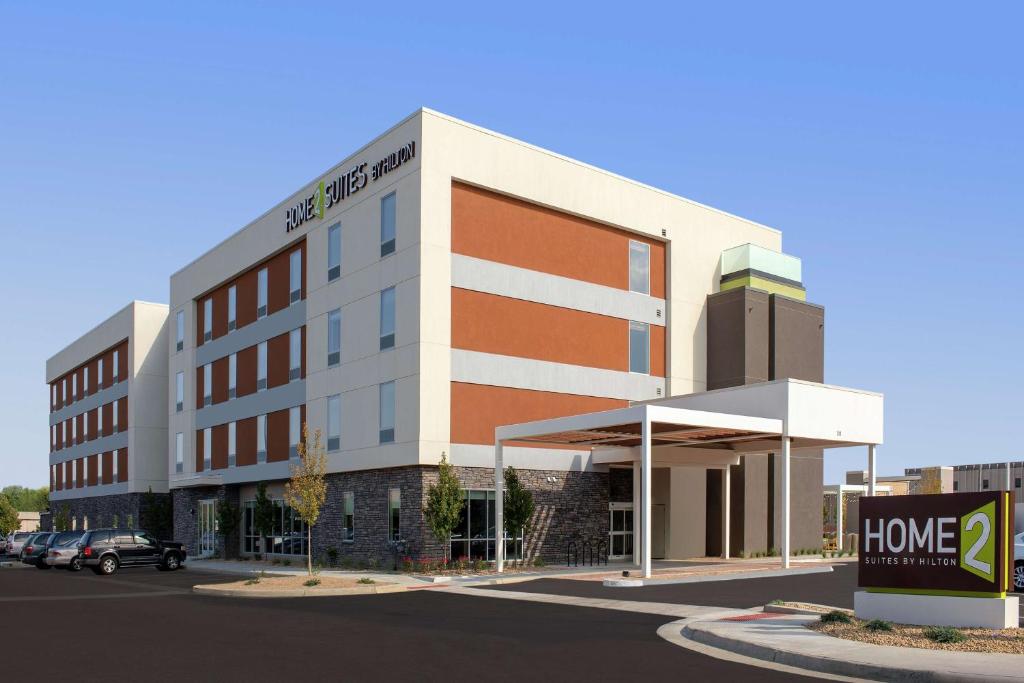 a rendering of a building with a home hospital at Home2 Suites By Hilton Longmont in Longmont