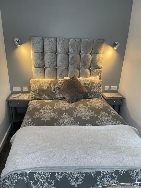 Postel nebo postele na pokoji v ubytování San Remo Apartments Blackpool