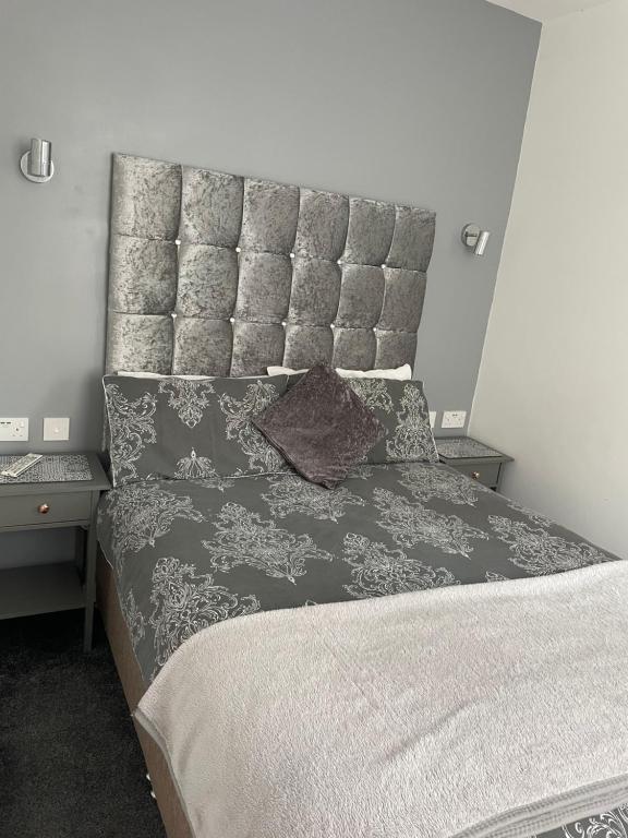 Postel nebo postele na pokoji v ubytování San Remo Apartments Blackpool