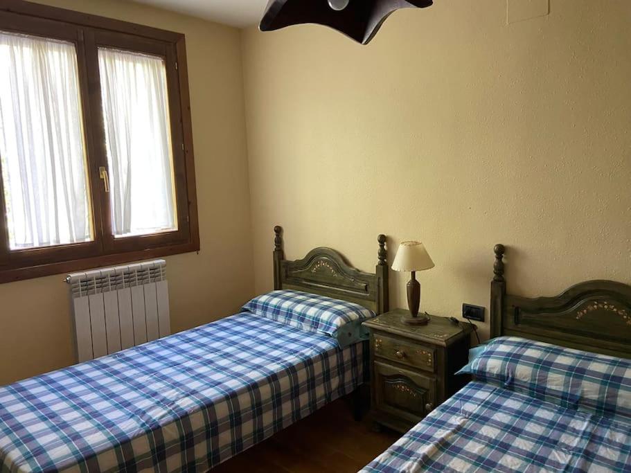 Postel nebo postele na pokoji v ubytování Casa Belius
