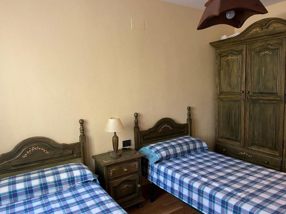 Postel nebo postele na pokoji v ubytování Casa Belius