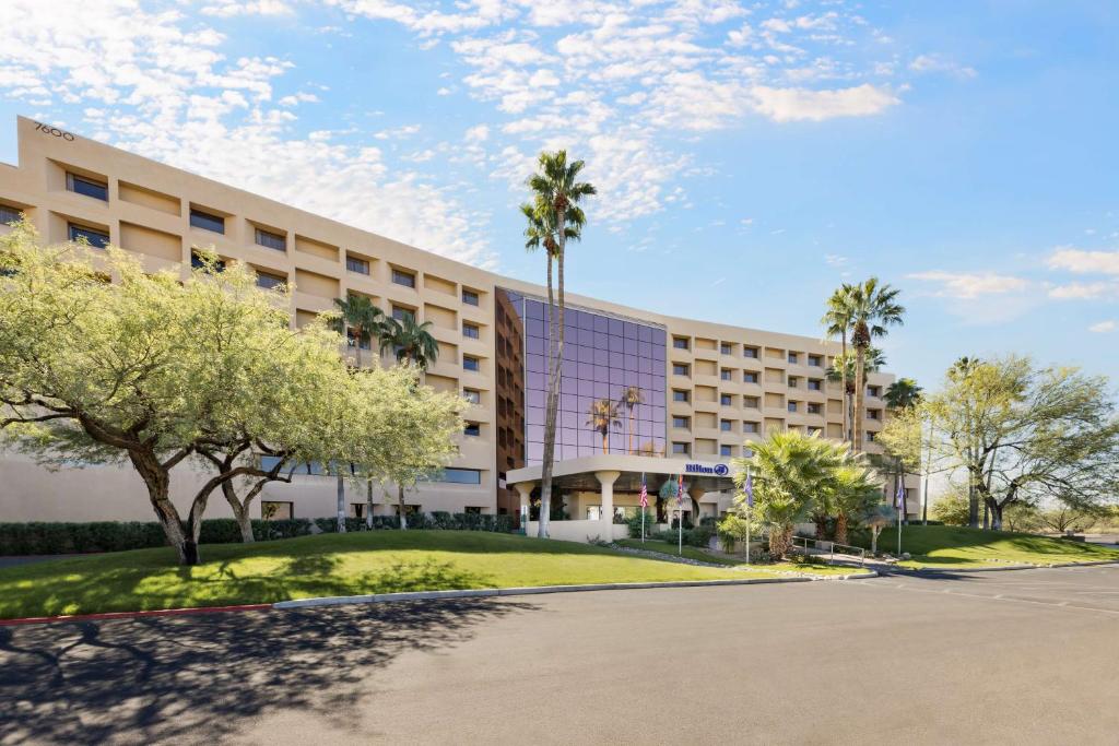 a rendering of the exterior of a hotel at Hilton Tucson East in Tucson