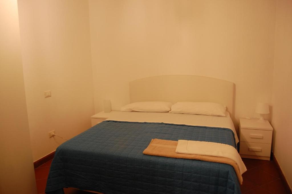 Postel nebo postele na pokoji v ubytování Casa VALGRAZIOSA