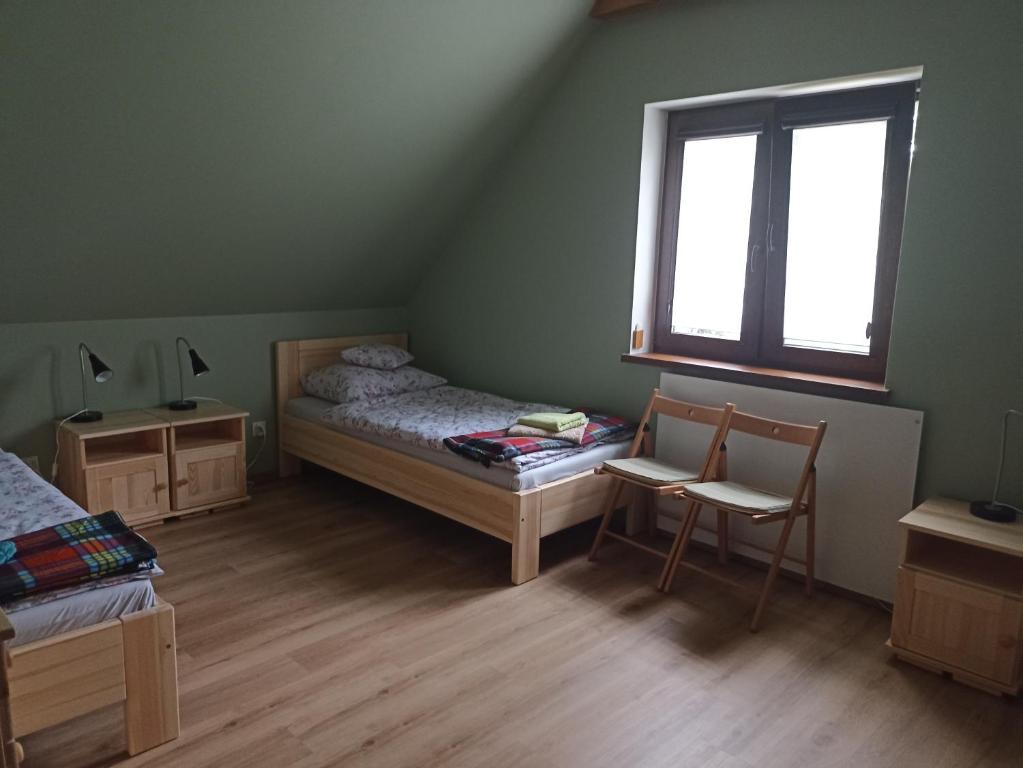 Postel nebo postele na pokoji v ubytování 4domki