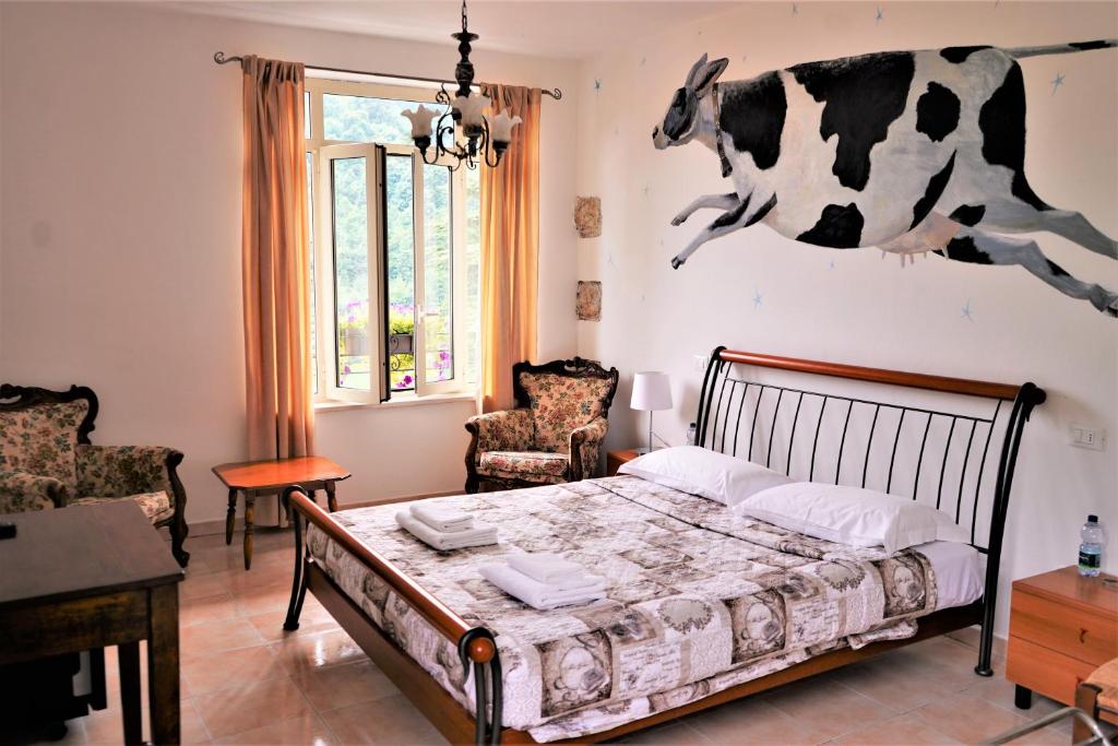Postel nebo postele na pokoji v ubytování Hotel Baldo
