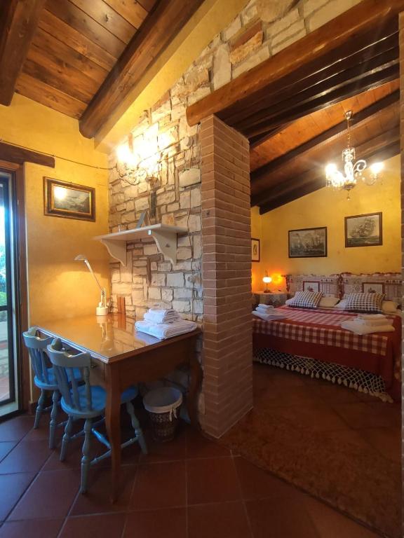 Postel nebo postele na pokoji v ubytování L'antica quercia