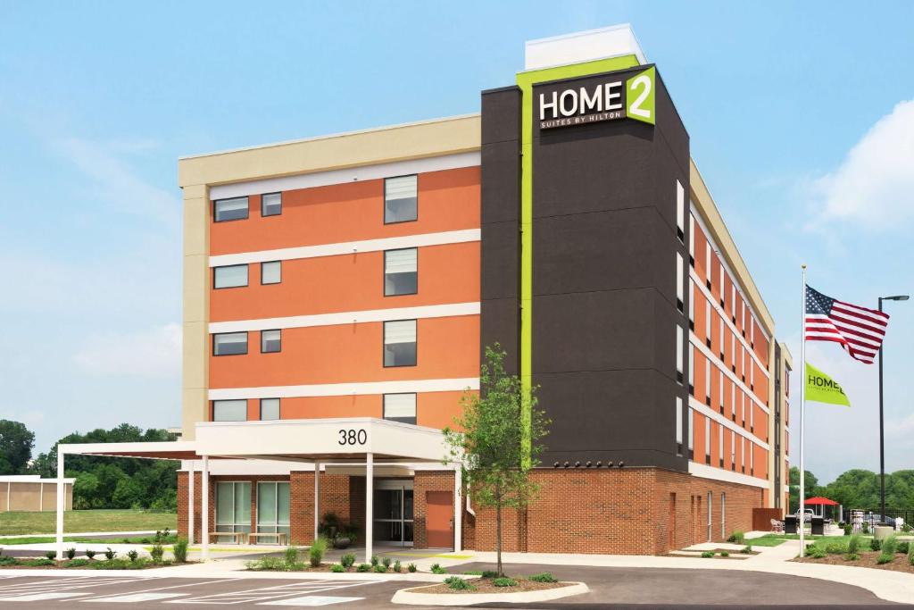 an office building with a home sign on it at Home2 Suites by Hilton Knoxville West in Knoxville
