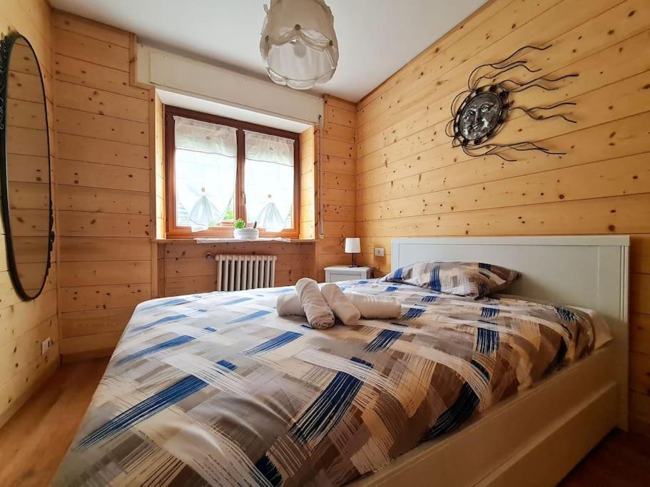 Ένα ή περισσότερα κρεβάτια σε δωμάτιο στο Cà dell'Agrifoglio