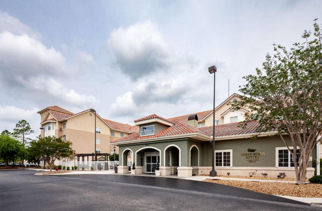 a large building with a street in front of it at Homewood Suites by Hilton Jacksonville-South/St. Johns Ctr. in Jacksonville