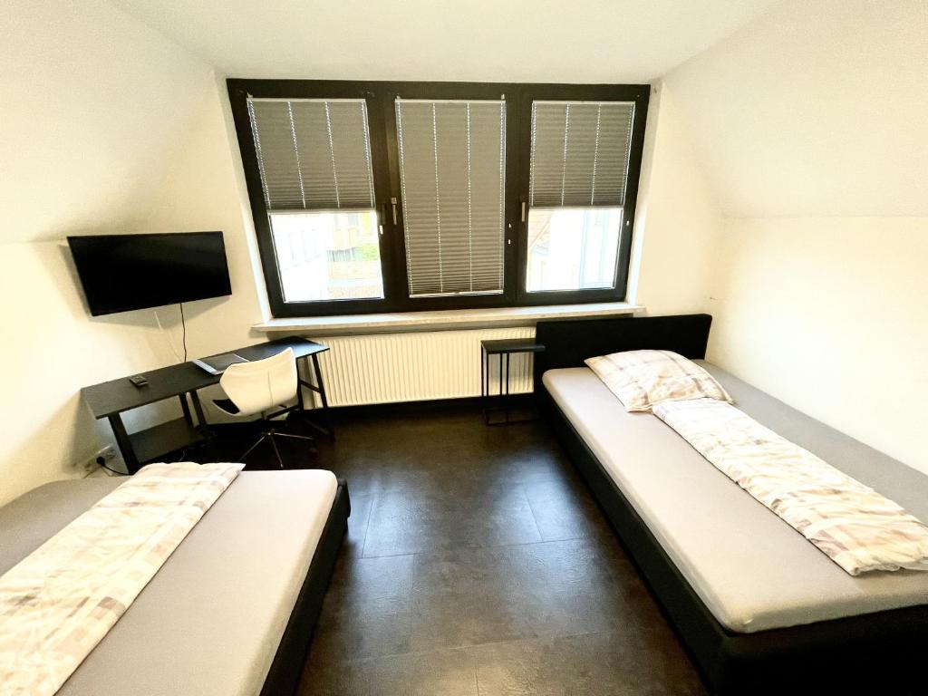 Katil atau katil-katil dalam bilik di Ferienwohnung Khorsandi Eins
