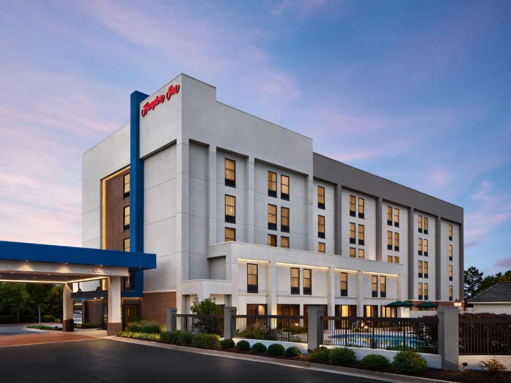 a rendering of the front of a hotel at Hampton Inn Charlotte/Matthews in Charlotte
