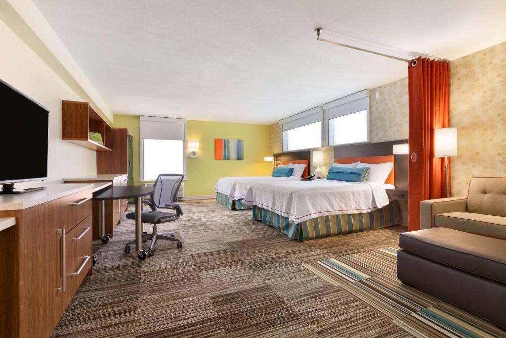Postel nebo postele na pokoji v ubytování Home2 Suites by Hilton Champaign/Urbana