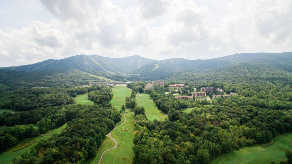 an aerial view of a valley with mountains at Killington Mountain Lodge, Tapestry Collection by Hilton in Killington