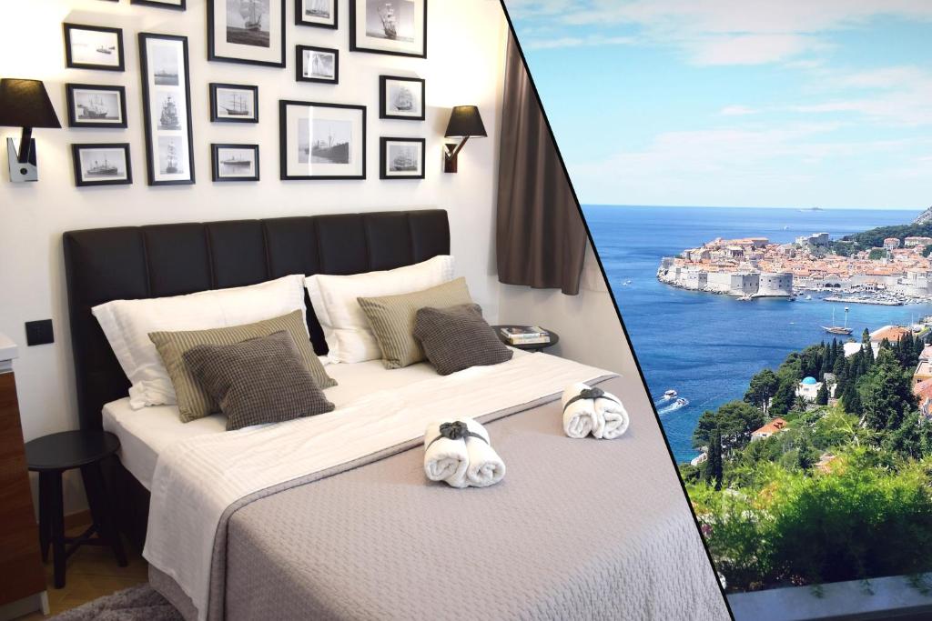 a bedroom with a bed with two stuffed animals on it at Blue Star Apartments in Dubrovnik