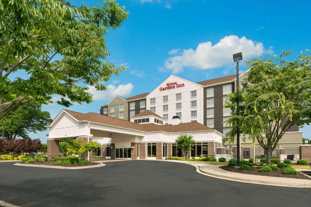 una representación de la parte delantera de un hotel en Hilton Garden Inn Greenville en Greenville