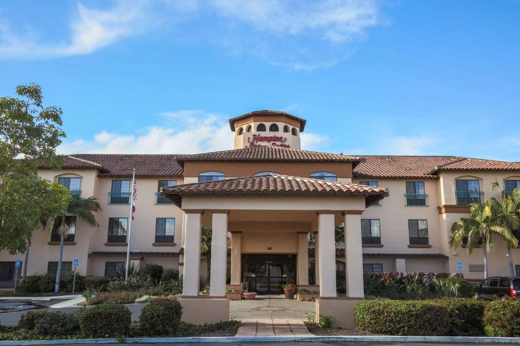 a building with a clock tower on top of it at Hampton Inn & Suites Camarillo in Camarillo