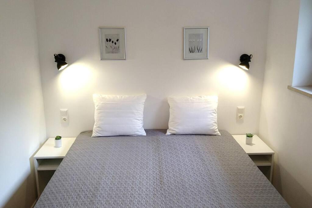 Posteľ alebo postele v izbe v ubytovaní Geräumige Ferienwohnung mit Seezugang