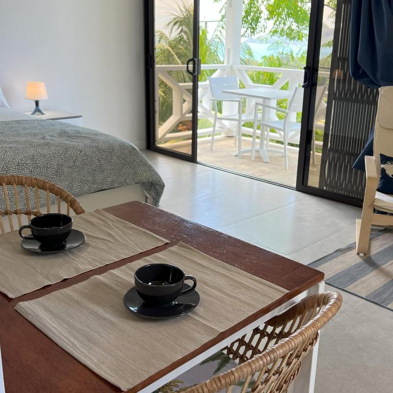 Postel nebo postele na pokoji v ubytování Naturalis - Oceanview Residences