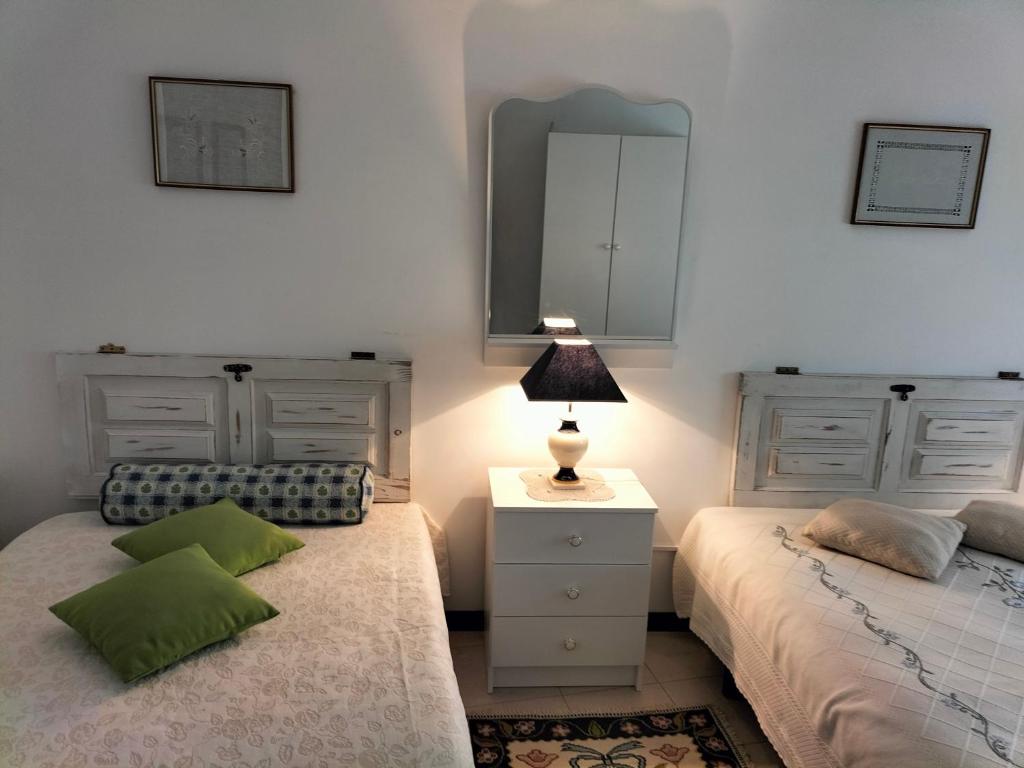 Voodi või voodid majutusasutuse Casa Aguarela, estilo familiar na Serra da Estrela toas