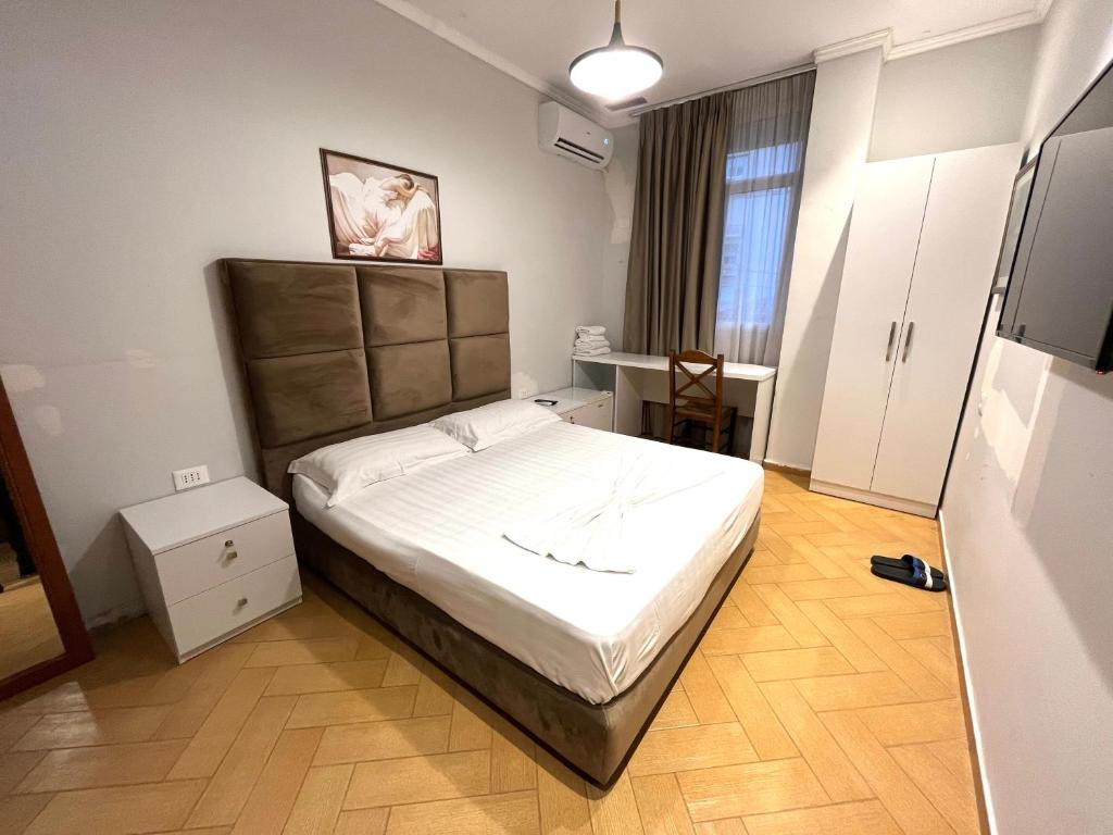 Postel nebo postele na pokoji v ubytování HOTEL NOBEL CENTER