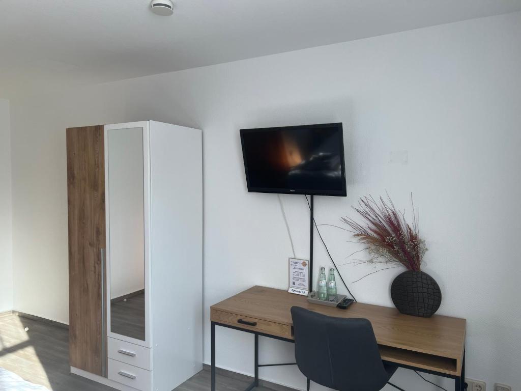 TV a/nebo společenská místnost v ubytování Hotel Restaurant Zum Landmann