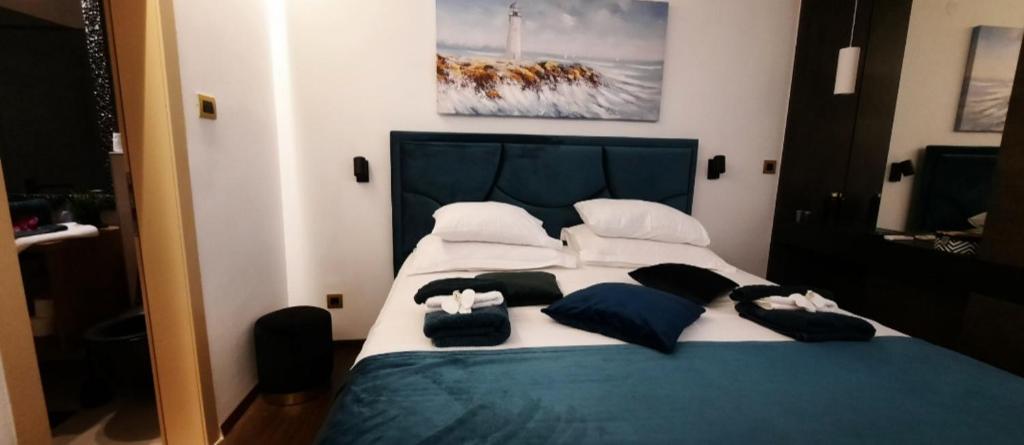 Posteľ alebo postele v izbe v ubytovaní Blue sea