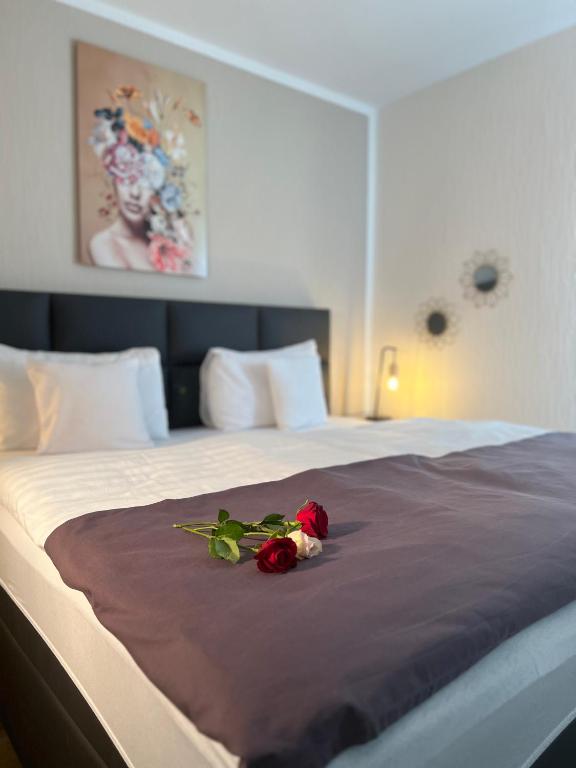 Postel nebo postele na pokoji v ubytování Hotel Restaurant Zum Landmann