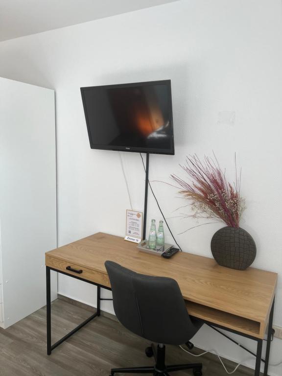 TV a/nebo společenská místnost v ubytování Hotel Restaurant Zum Landmann