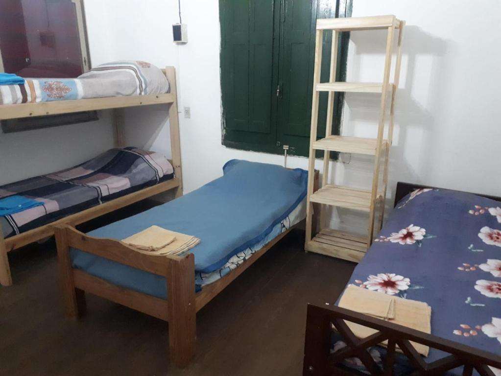 Postel nebo postele na pokoji v ubytování Alojamiento Hospedaje Lodeolga "La Florida"