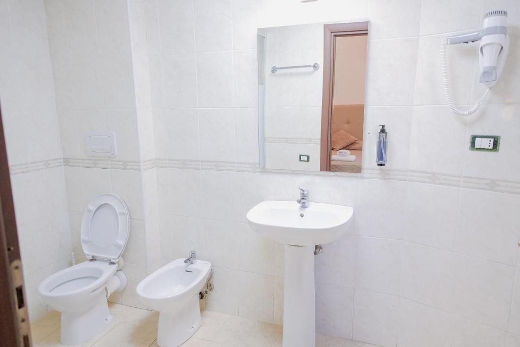 Koupelna v ubytování Hotel Alex Square